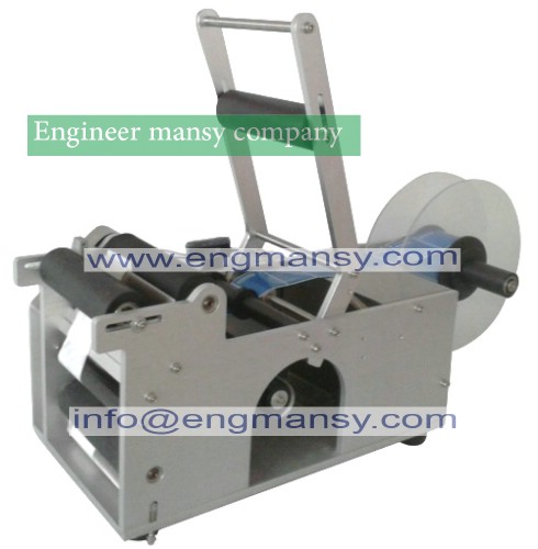 semi-automatic non-setting adhesive round bottle labeling machine model 831 engineer mansy international mark